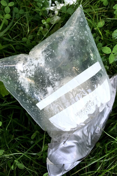 taped ziploc bag filled with gas after mixing baking soda and vinegar