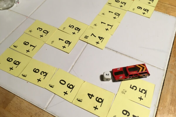 race track counting game made out of flash cards