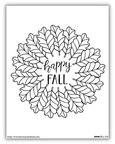 oak leaves in a wreath with happy fall in center