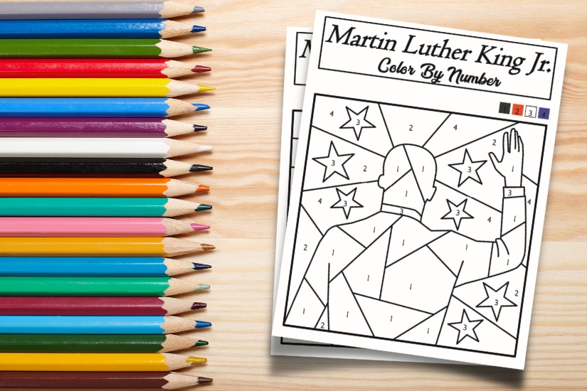 martin luther king jr. color by number pages on a desk with colored pencils
