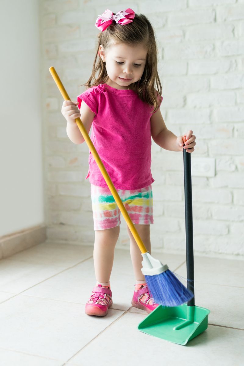 toddler sweeping